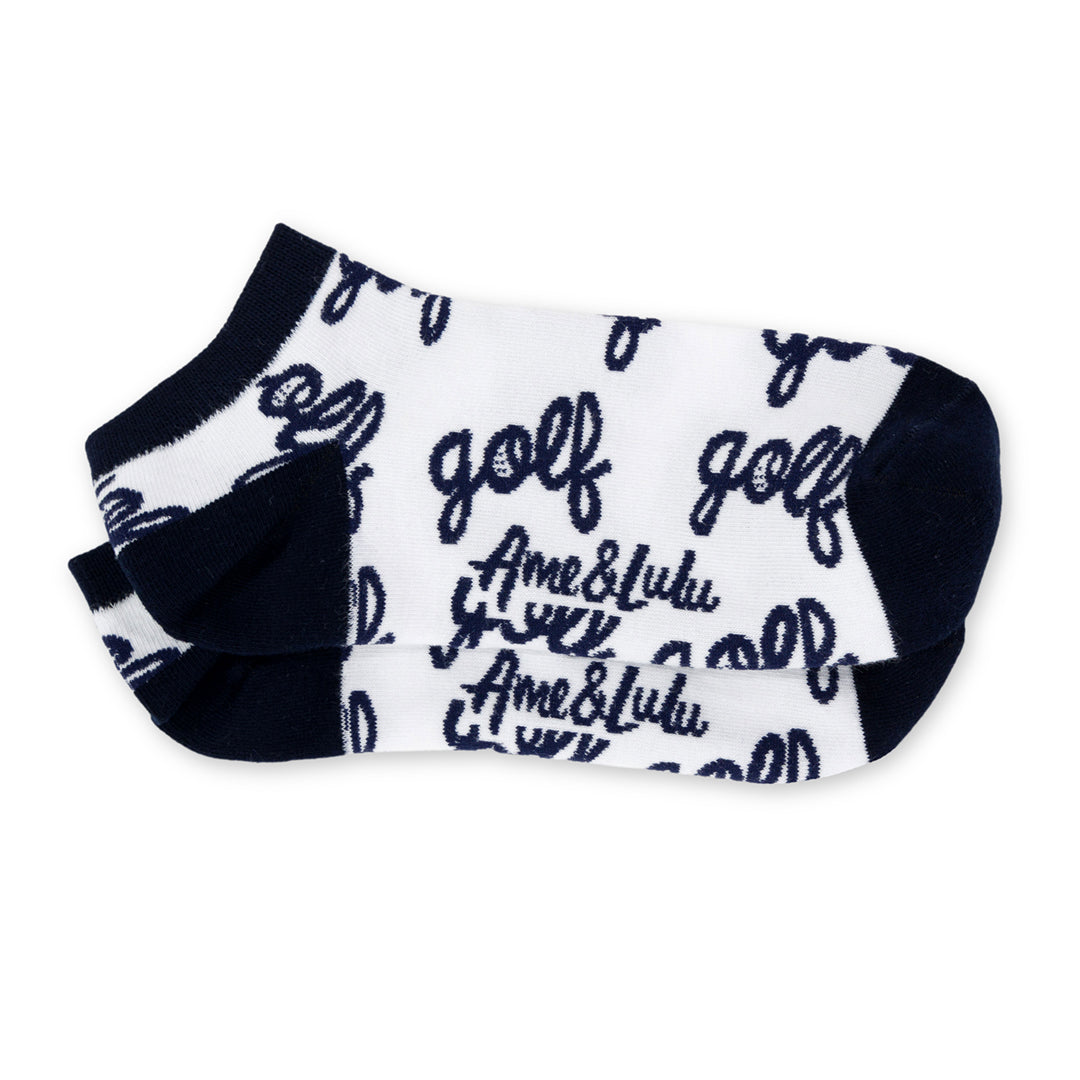 pair of white socks with pattern of word golf in cursive font