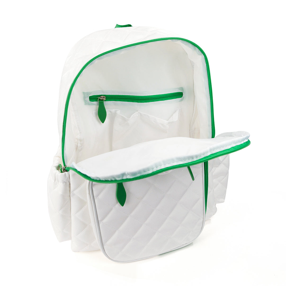 Inside view of pickleball backpack with white quilted nylon fabric. Backpack has green trim and front paddle pocket.