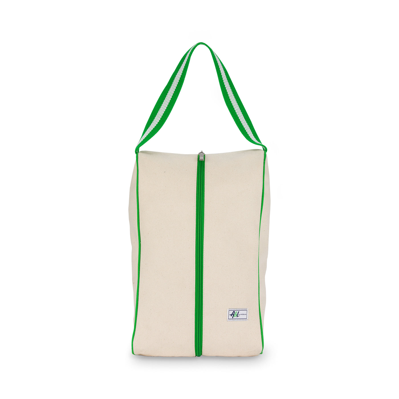 rectangular tan canvas shoe bag with lime green handles.