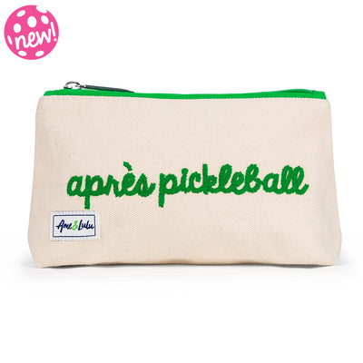 Front view of small natural canvas makeup pouch with green trim and green embroidery reading "Après Pickleball"