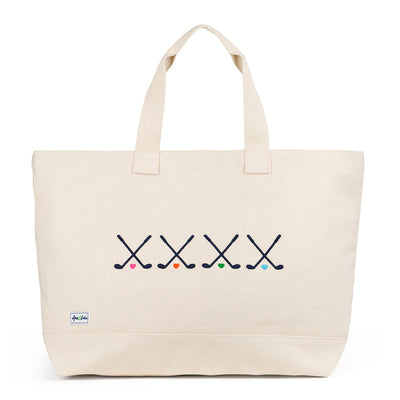 Canvas large tote with four sets of crossed clubs embroidered on the front