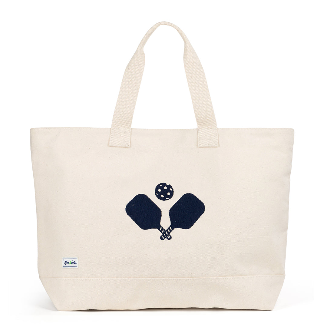 Canvas large tote with navy crossed pickleball paddles embroidered on the front