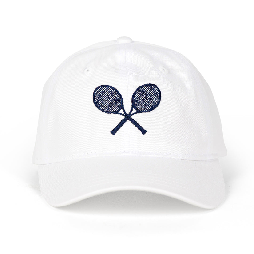 Front view of white baseball hat with navy crossed racquets embroidered on front