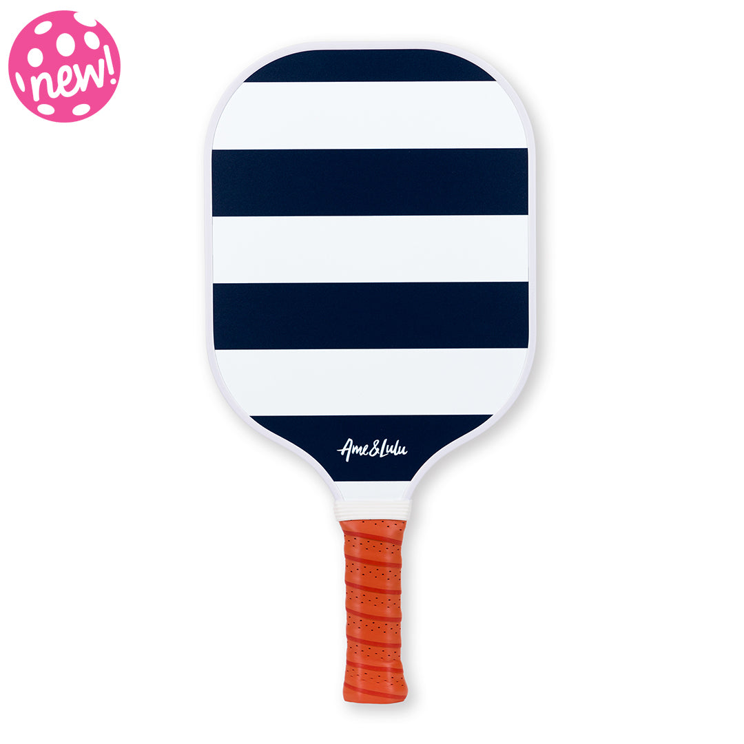 Navy and white striped pickleball paddle with tan faux leather handle. 