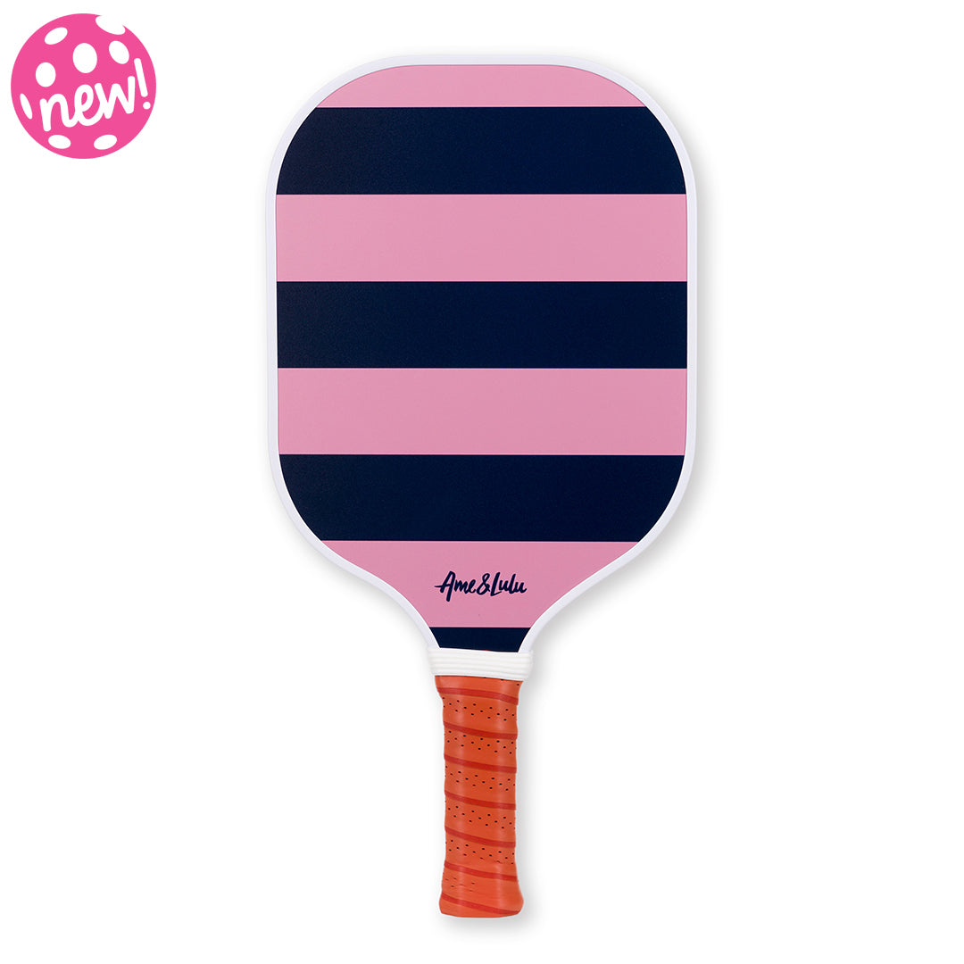 Navy and pink striped pickleball paddle with tan faux leather handle.