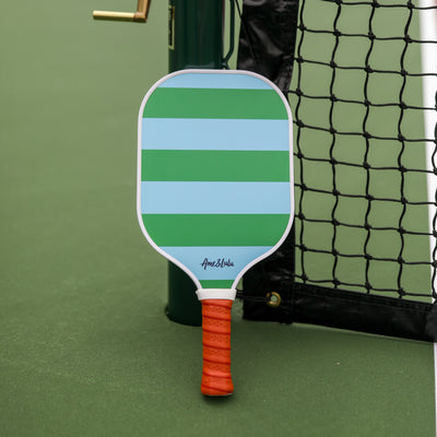 Blue and green striped pickleball paddle with tan faux leather handle