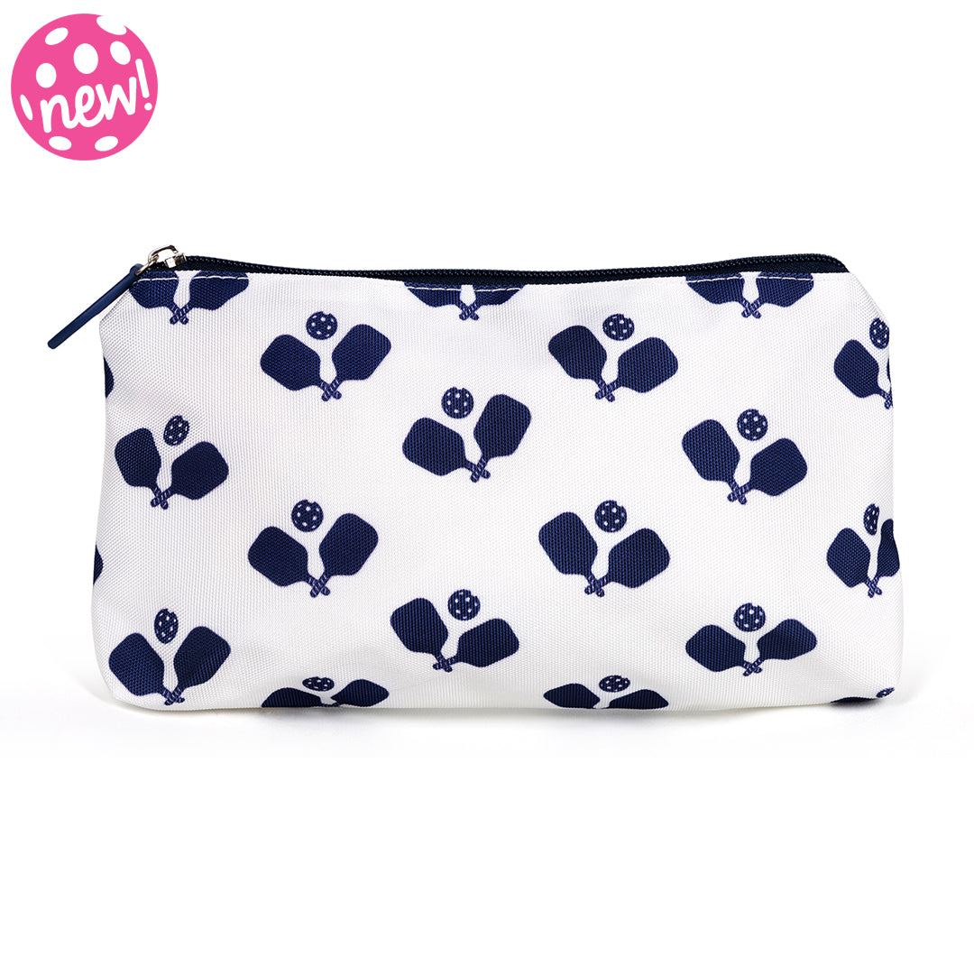 Front view of small nylon makeup pouch. Pouch is white with navy trim and navy crossed pickleball paddles printed on it.