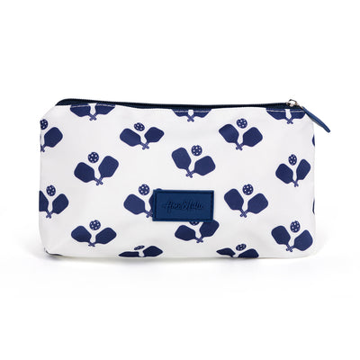 Back view of small nylon makeup pouch. Pouch is white with navy trim and navy crossed pickleball paddles printed on it.