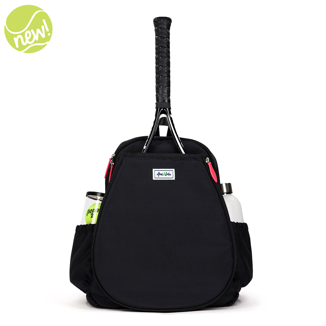 Front view of black game on tennis backpack with coral zippers. Front pocket hold tennis racquets.