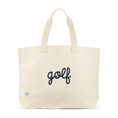 canvas tote with the world "golf" stitched in navy cursive