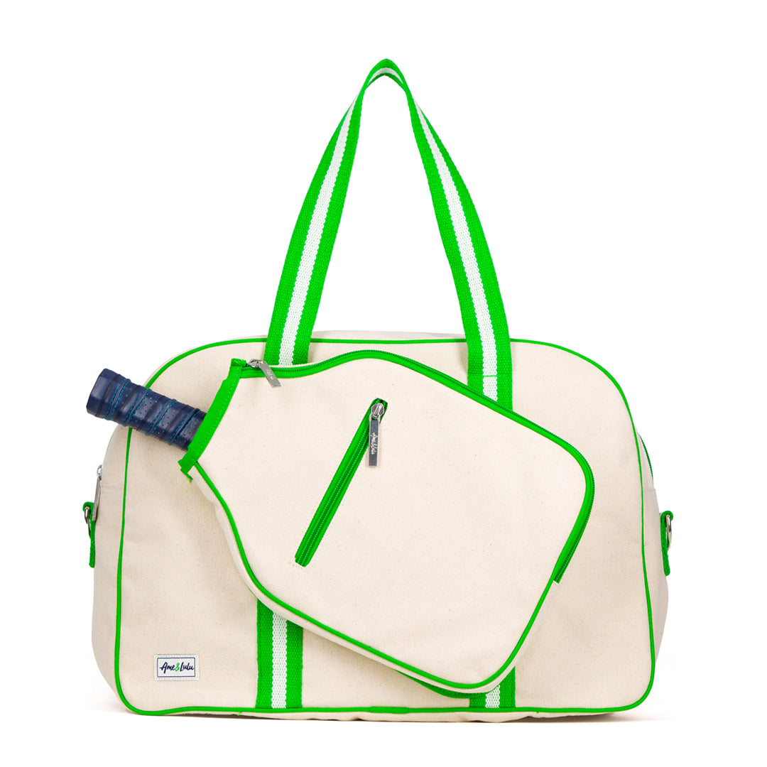 natural colored canvas pickleball bag with green cotton webbing straps