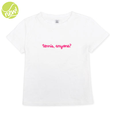 White t shirt lays flat on a white background. The front is embroidered with the words "tennis anyone" in hot pink cursive font