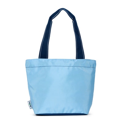 view of light blue mini surfside tote with navy straps
