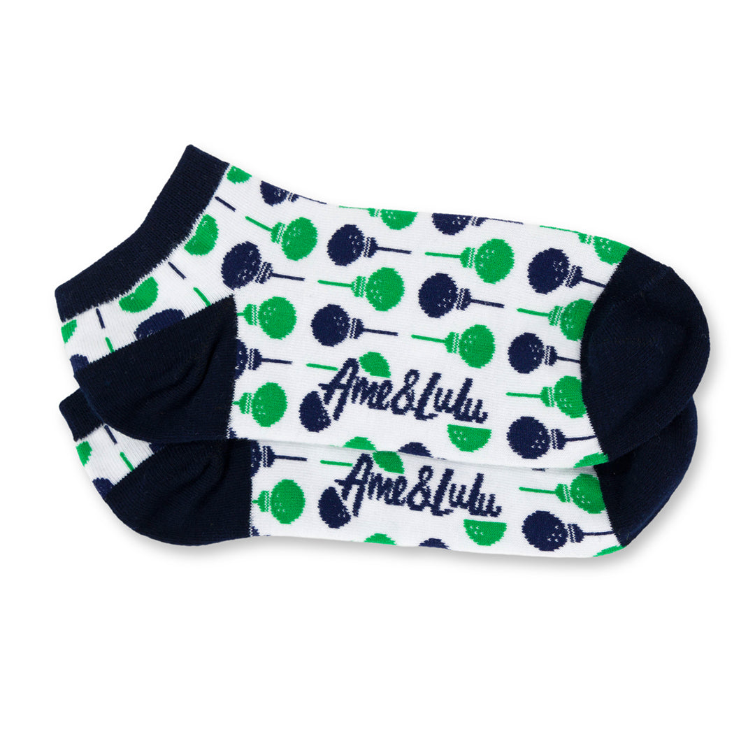 pair of white socks with navy and green golf ball and tee pattern