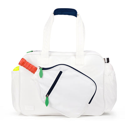 Front view of white pickleball tote with navy trim and green zipper pulls. Tote had front paddle pocket.