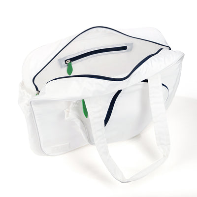 Inside view of white pickleball tote with navy trim and green zipper pulls. Tote had front paddle pocket.