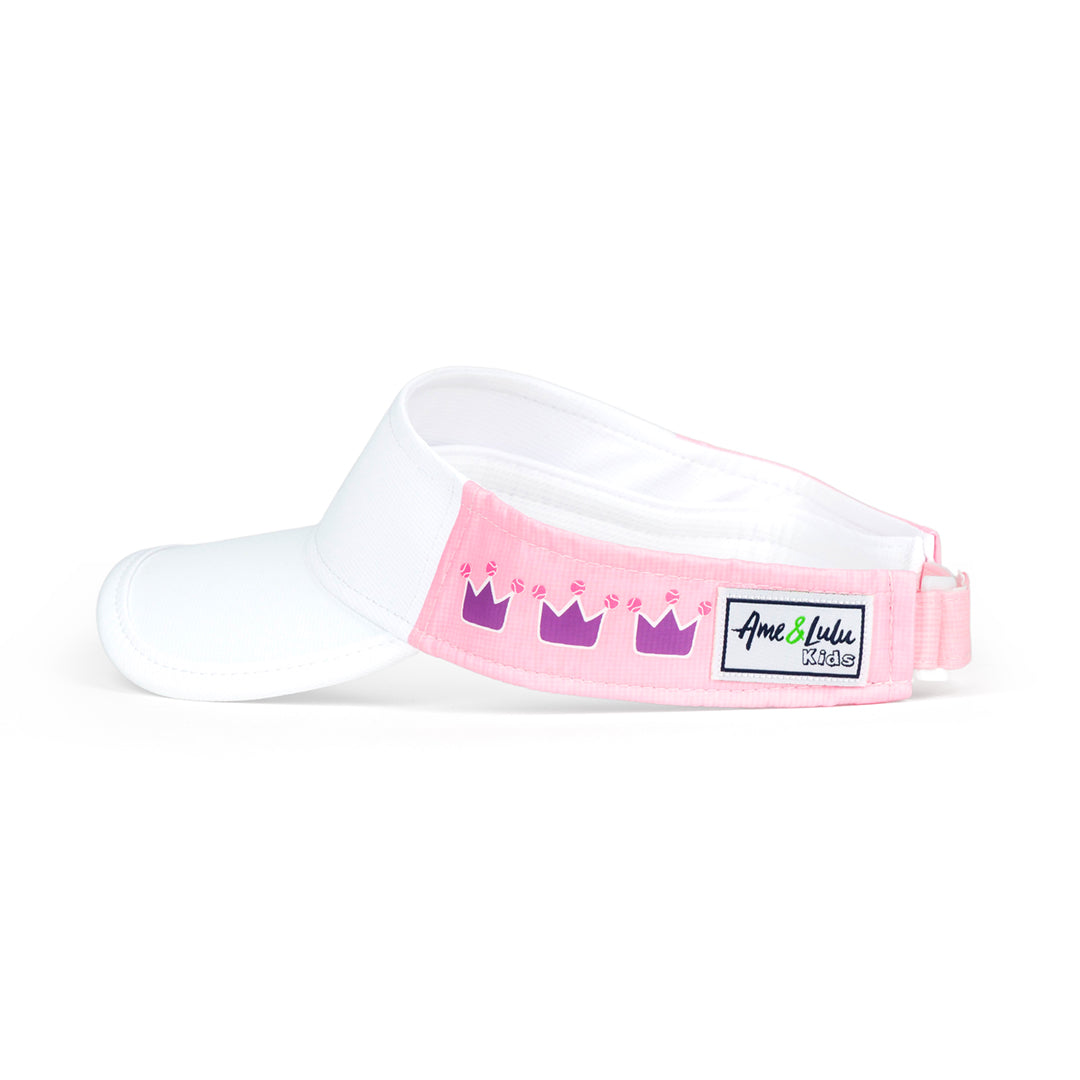 Side view of light pink kids visor with purple crowns on the side.