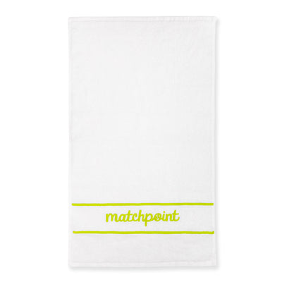 White cotton terry towel with the word "matchpoint" embroidered on in lime with embroidered line above and below the word.