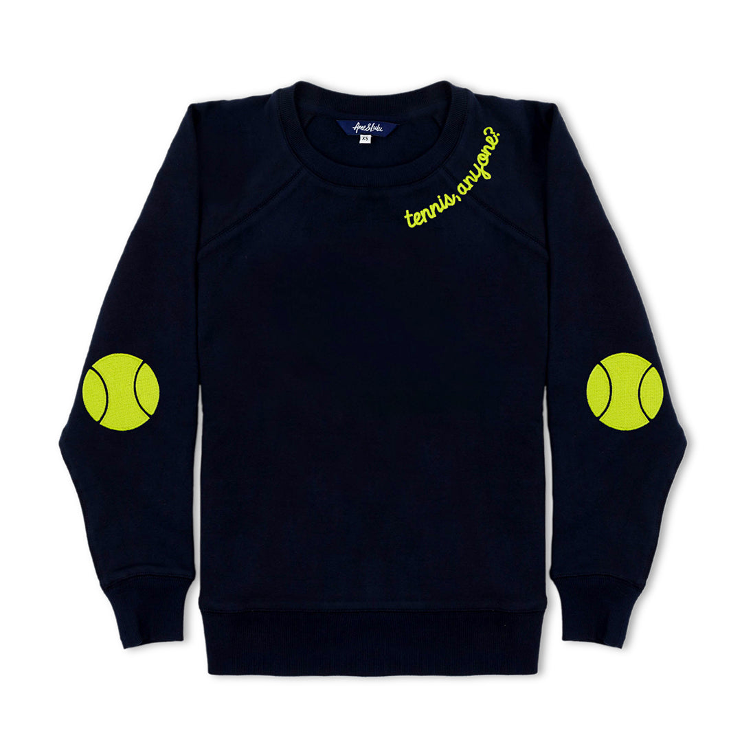 Navy women's sweatshirt with lime embroidery on neckline that reads "tennis anyone" and embroidered tennis ball patches on the elbows.
