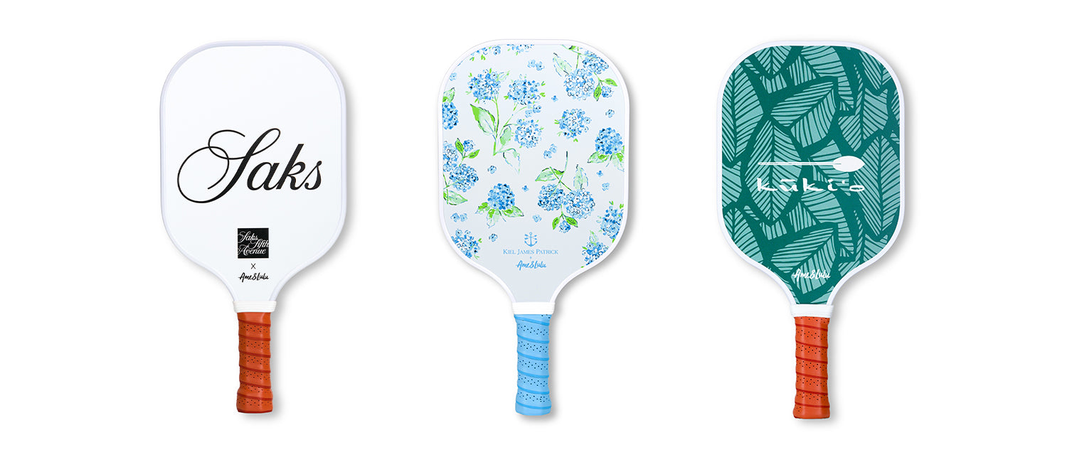 Three stylish paddle racquets with distinct designs, showcased as part of our active lifestyle accessories collection.