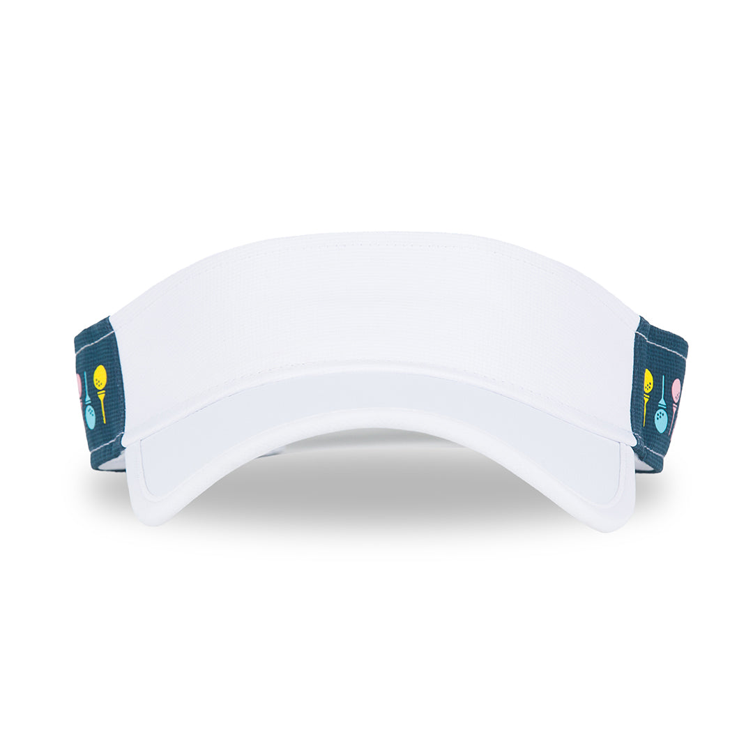front view of navy womens visor with pastel rainbow golf balls and tee printed on sides.