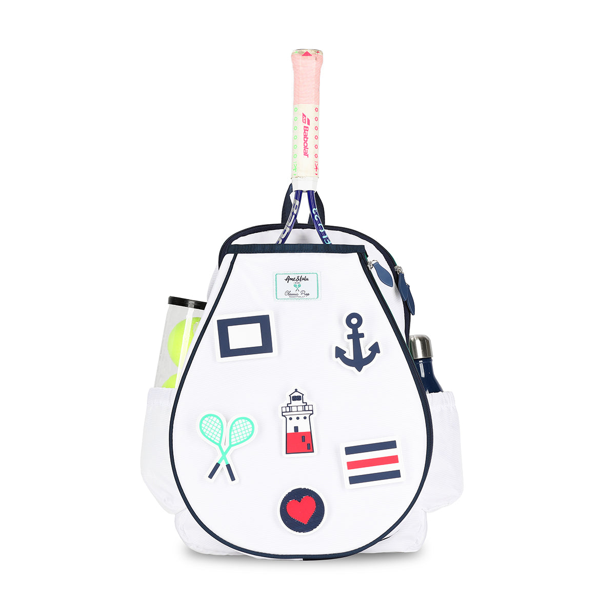 Front view of white kids tennis backpack with removeable patches. Patches are nautical themes with anchor, lighthouse, sailing flags, crossed racquets and heart.
