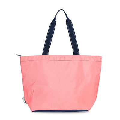 coral nylon tote bag with navy handles