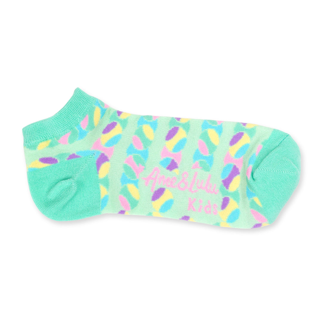 pair of light green kids socks with pastel rainbow tennis balls stitched around socks
