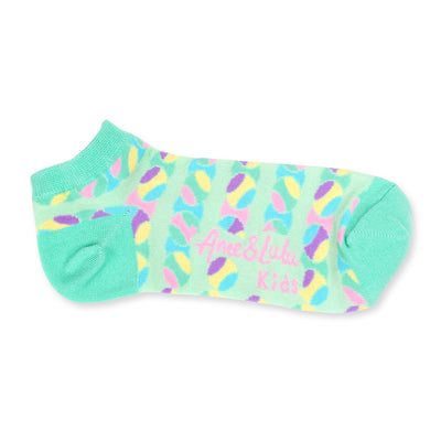 pair of light green kids socks with pastel rainbow tennis balls stitched around socks