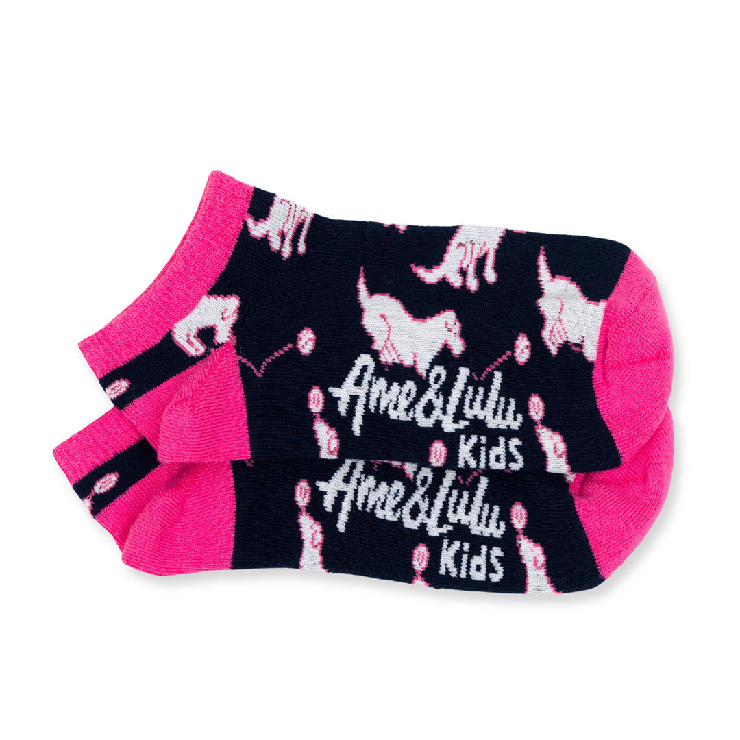 pair of navy kids socks with hot pink heel and toes with white puppies stitched on socks