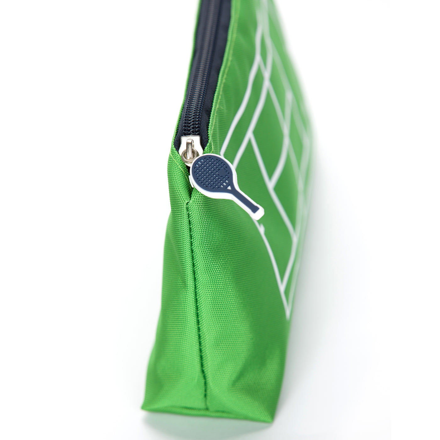 Close up view of navy and white tennis racquet shaped zipper on everyday pouch.