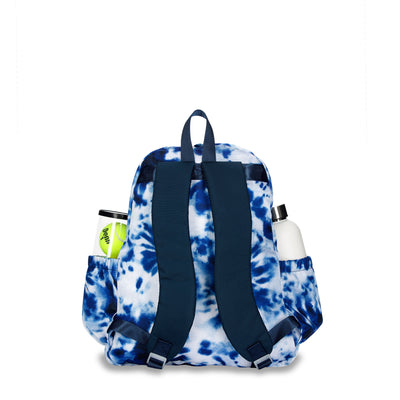 Back view of navy and white tie dye tennis backpack. Backpack has water bottle and tennis balls in side pockets.