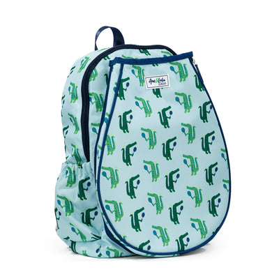 side view of blue kids tennis backpack with navy trim and repeat green alligator pattern