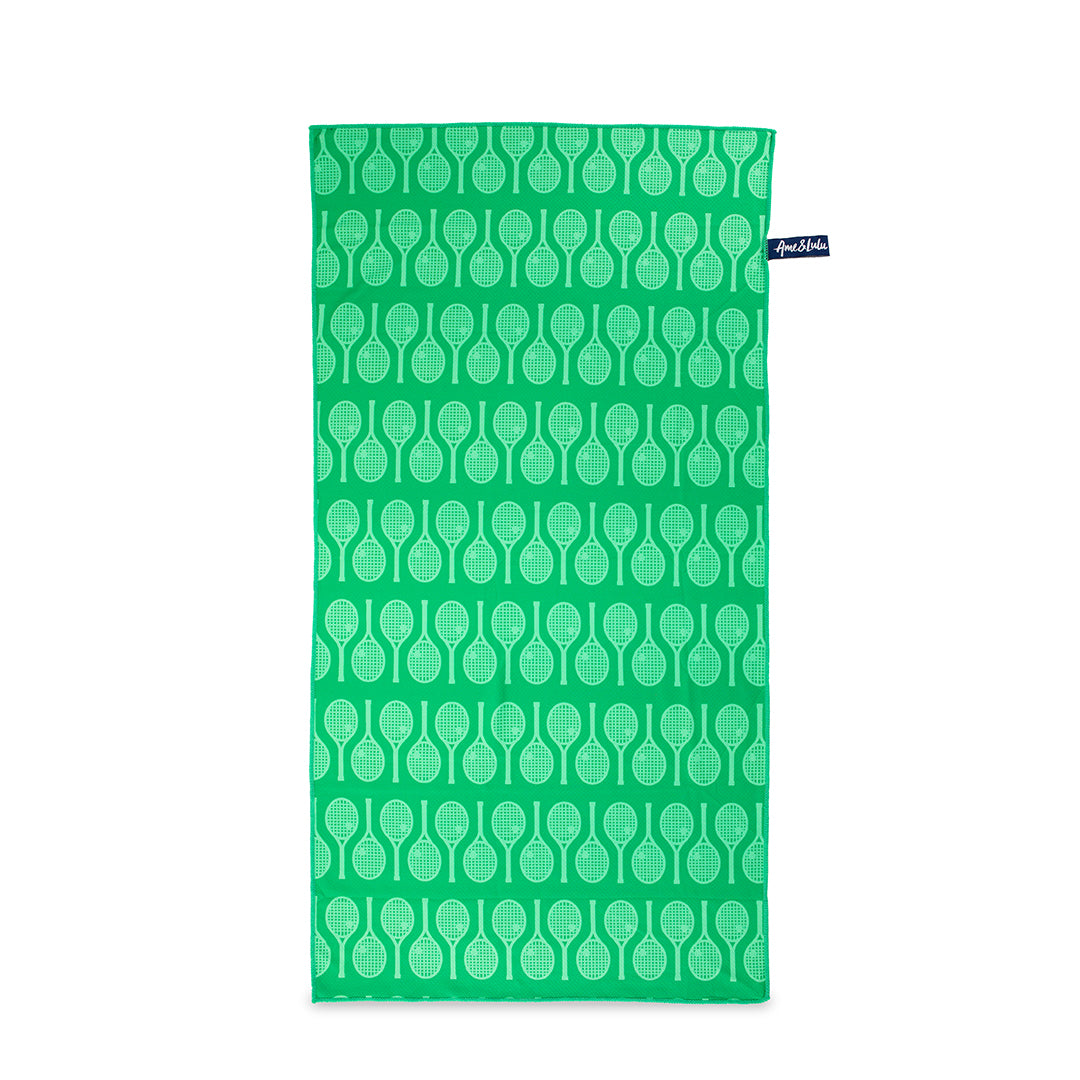 Green rectangular towel with repeating light green tennis racquet pattern
