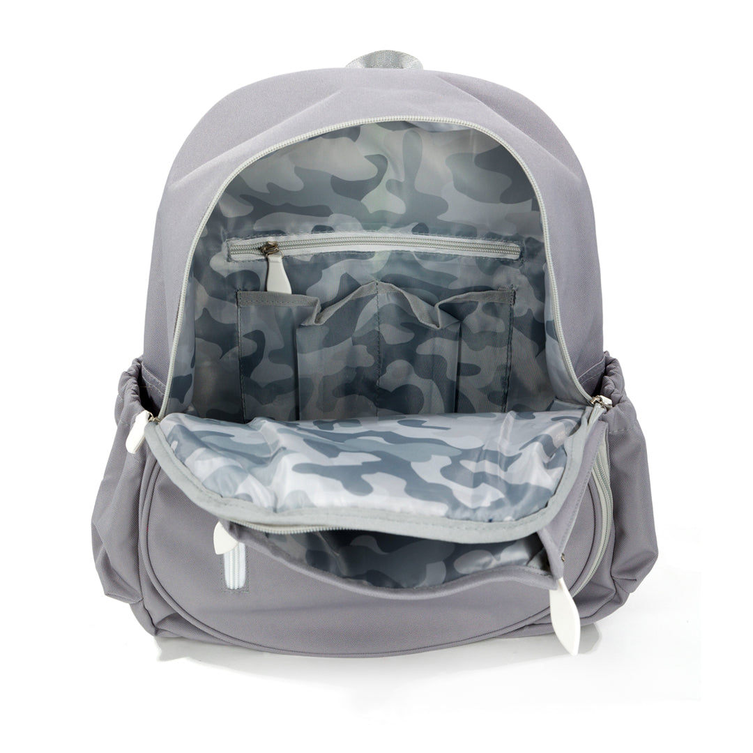 Inside view of grey tennis backpack showing the inside grey camo pattern of the backpack.