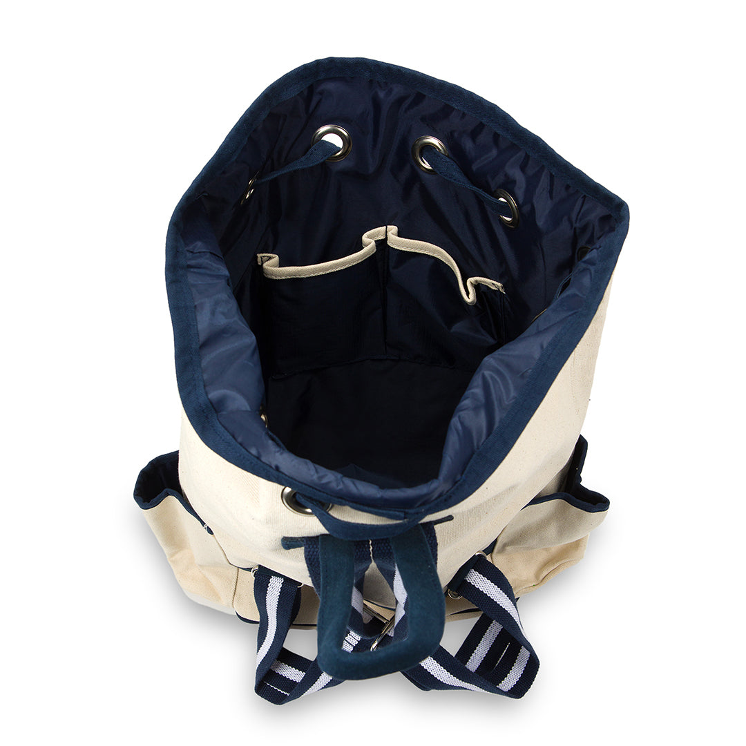 Inside view of canvas tennis backpack with navy interior 
