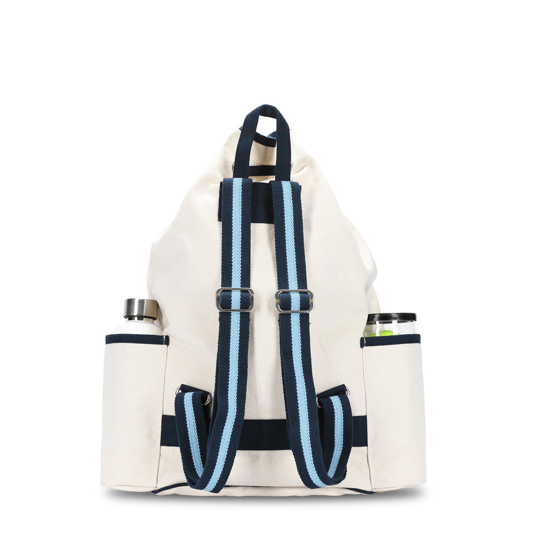 Back view of canvas tennis backpack with navy and blue straps