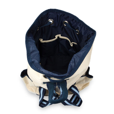 Inside view of canvas tennis backpack with navy interior