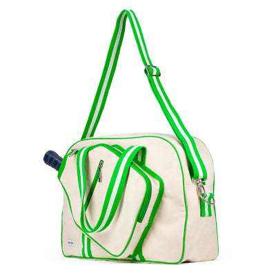side view of natural colored canvas pickleball bag with green cotton webbing straps