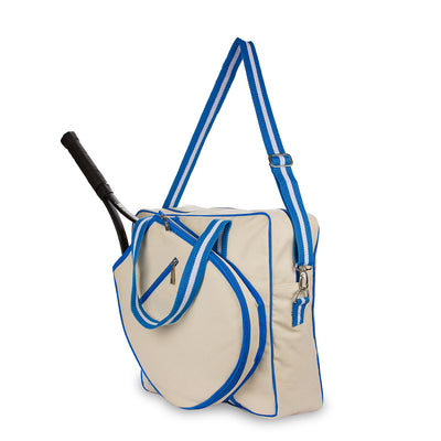 Side view of canvas tennis tote with blue handles