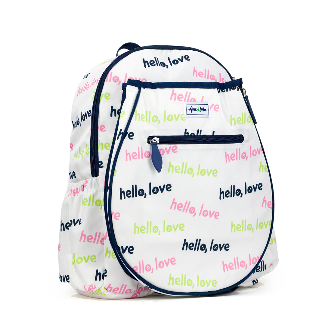 Side view of white kids tennis backpack with repeating patterns of the words hello love in pink green and navy.