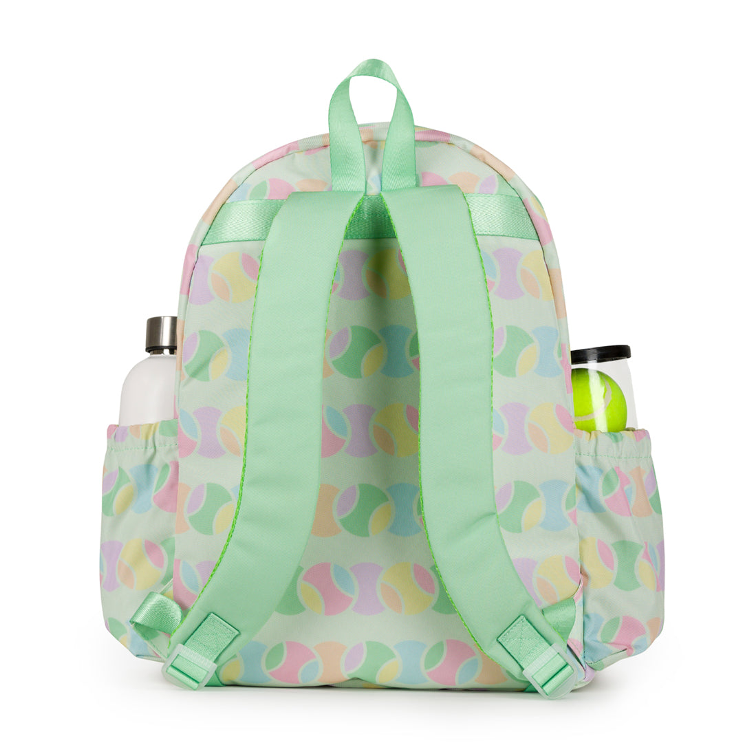 Back view of light green kids tennis backpack with repeating pastel tennis ball pattern. straps are light green