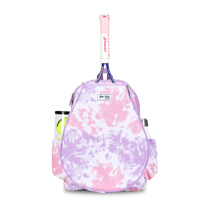 Front view of a pink and purple tie dye kids tennis backpack. There is a racquet pocket in the front holding a tennis racquet.
