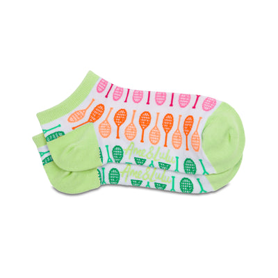 Pair of white socks with lime green heels and toes. Rainbow racquets are printed around the socks.