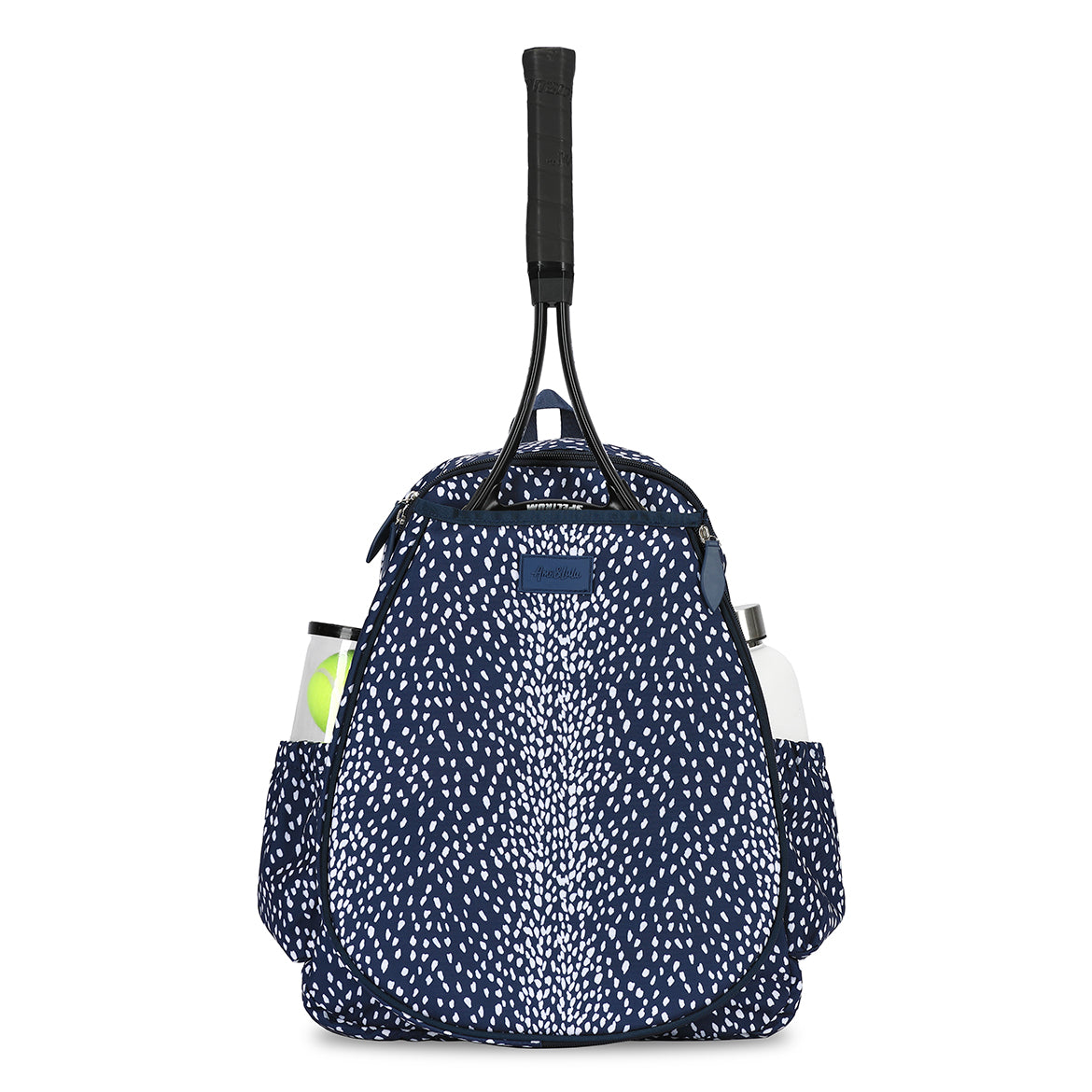 Front view of navy and white spotted antelope pattern tennis backpack. Backpack has water bottle and tennis balls in side pockets.
