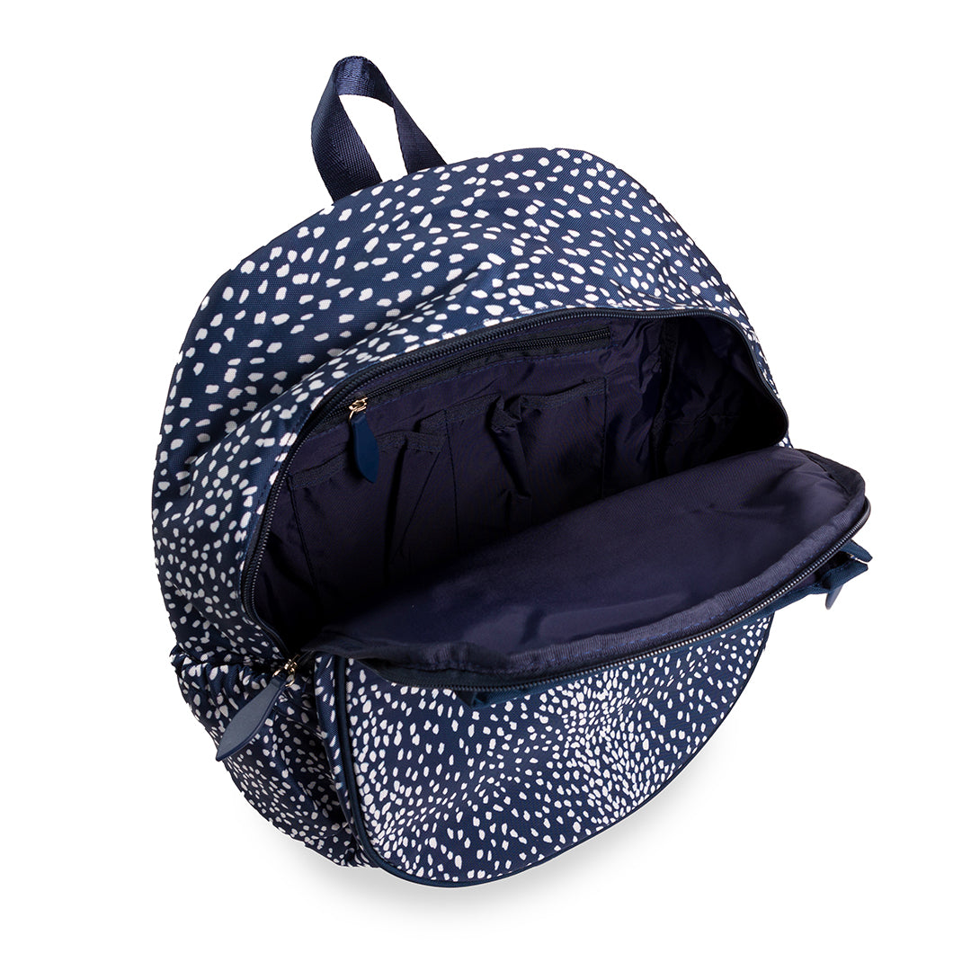 Inside view of navy and white spotted antelope pattern tennis backpack.