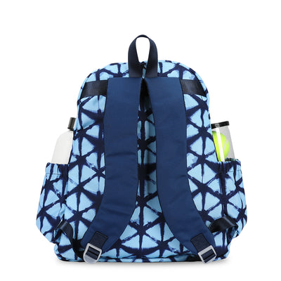 Back view on navy and blue shibori tie dye pattern tennis backpack.