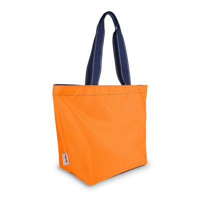 side view of orange nylon tote bag with navy straps