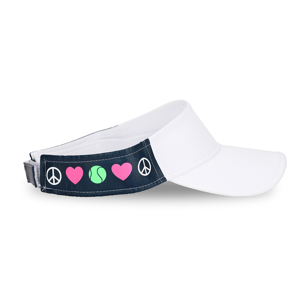 Side view of navy kids visor with white peace sign, pink heart and green tennis ball printed on sides