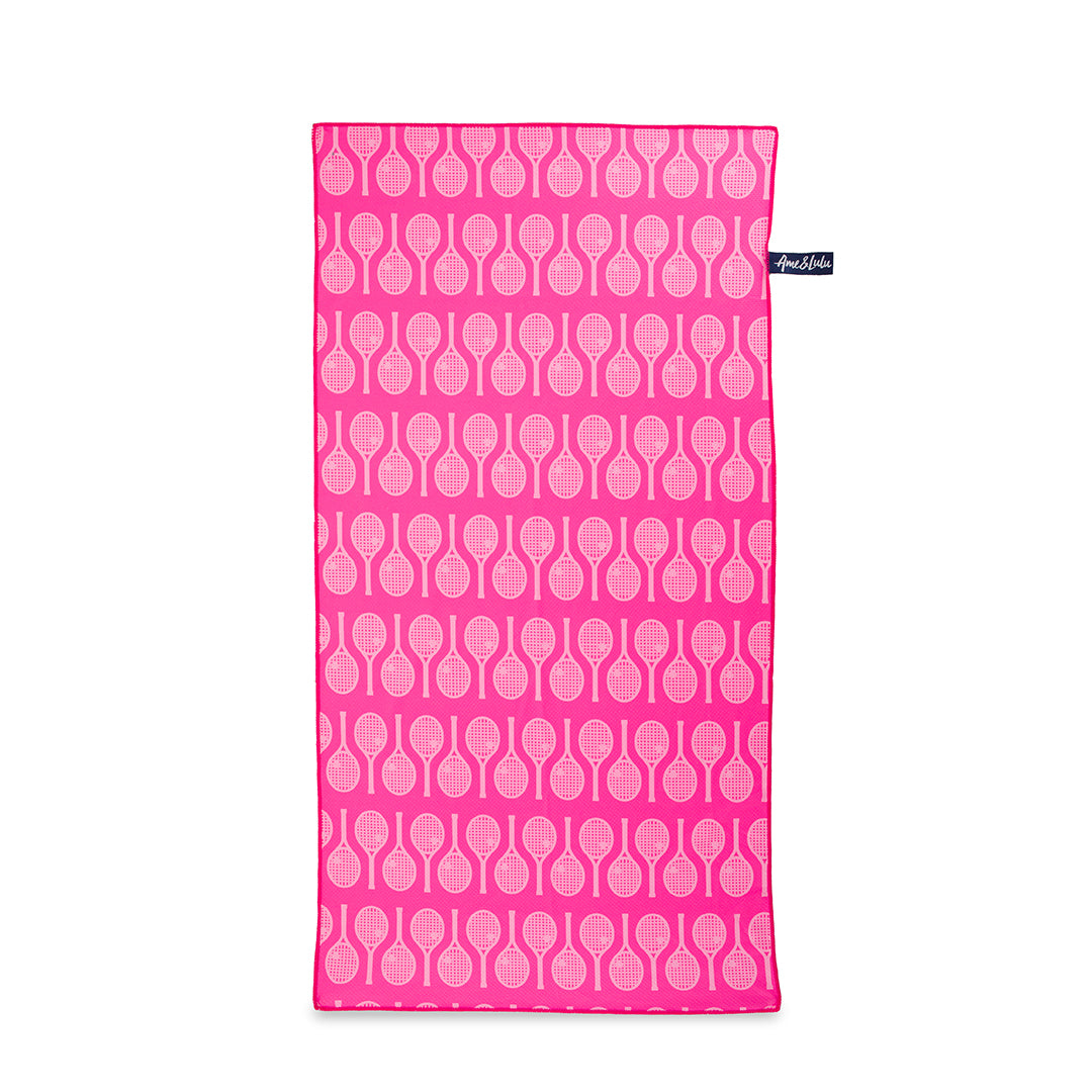 Hot pink rectangular towel with repeating light pink tennis racquet pattern